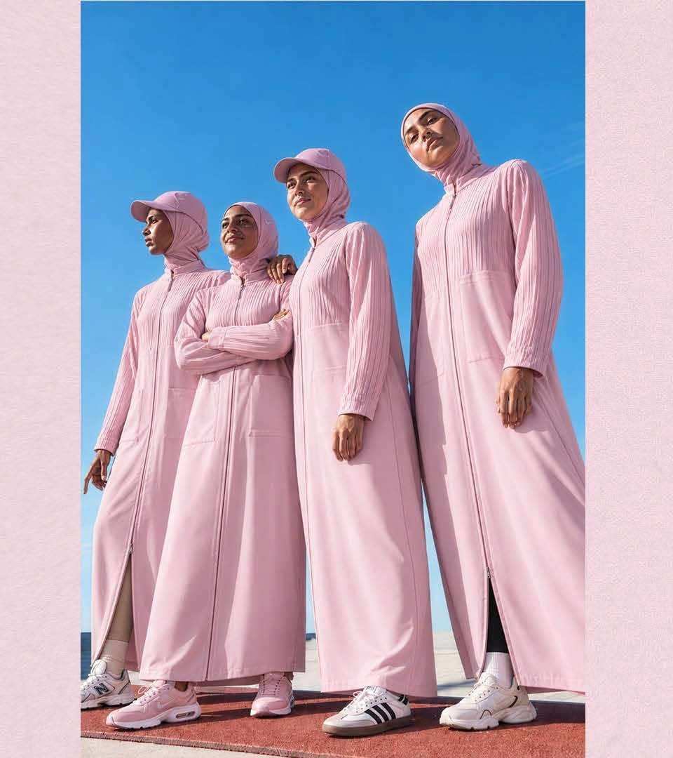 Four women wearing the pink DAS Sports Abaya